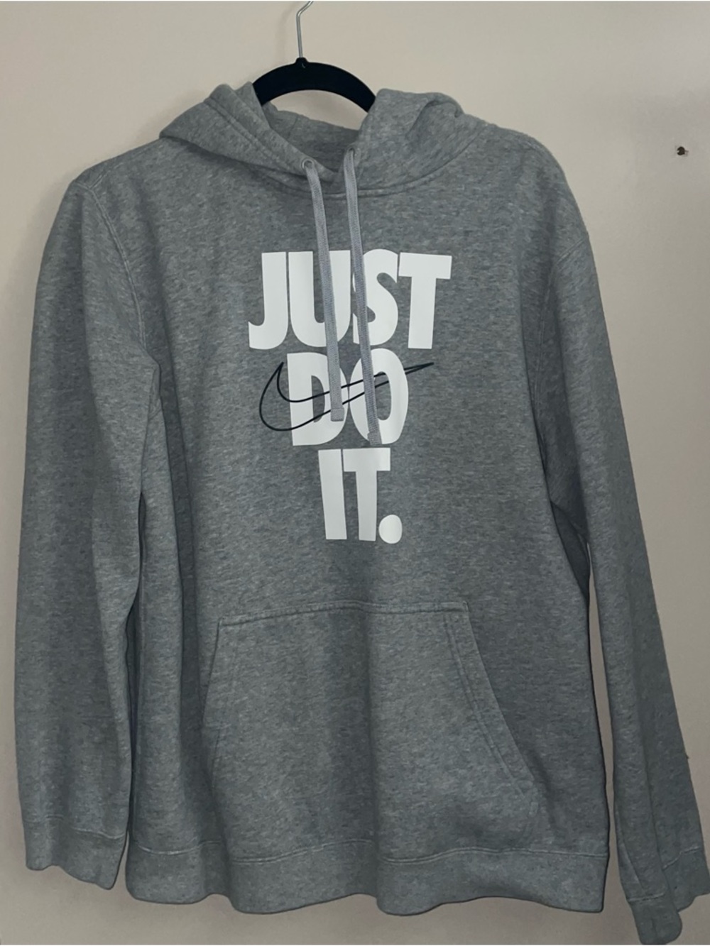 Nike Gray Pullover Hoodie with White "JUST DO IT." Graphic